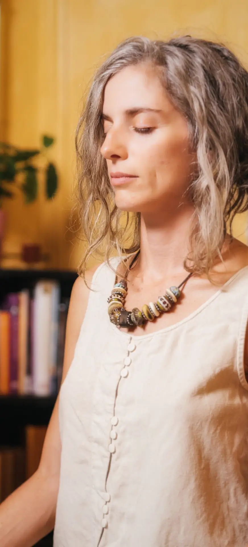 Maina Petry meditating with eyes closed, Vedic Meditation teacher in Detroit